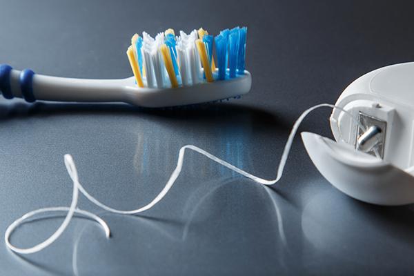 Avoid cavities by brushing and flossing regularly
